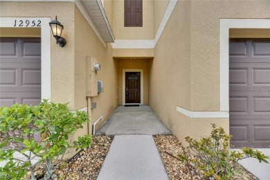 Welcome to 12952 Utopia Gardens Way - Tranquil Living with Water on Summerfield Crossing Golf Club in Florida - for sale on GolfHomes.com, golf home, golf lot