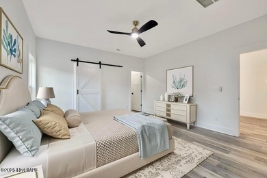 Discover a home that flawlessly blends modern sophistication on Carolina Shores Golf Course in North Carolina - for sale on GolfHomes.com, golf home, golf lot