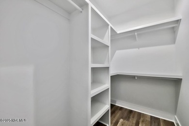 Discover a home that flawlessly blends modern sophistication on Carolina Shores Golf Course in North Carolina - for sale on GolfHomes.com, golf home, golf lot