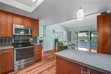 Charming corner end unit in private and peaceful Mutual 3 at on Leisure World Seal Beach Golf Course in California - for sale on GolfHomes.com, golf home, golf lot