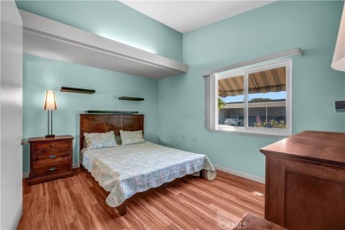 Charming corner end unit in private and peaceful Mutual 3 at on Leisure World Seal Beach Golf Course in California - for sale on GolfHomes.com, golf home, golf lot