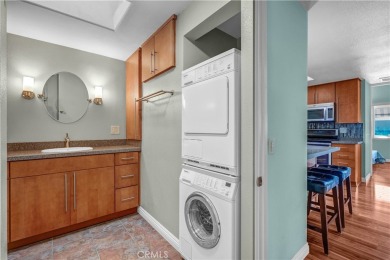 Charming corner end unit in private and peaceful Mutual 3 at on Leisure World Seal Beach Golf Course in California - for sale on GolfHomes.com, golf home, golf lot