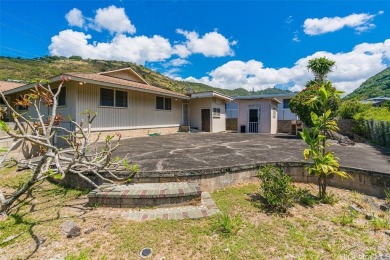 Come home and relax in this well-maintained Moanalua Valley on Moanalua Golf Club in Hawaii - for sale on GolfHomes.com, golf home, golf lot
