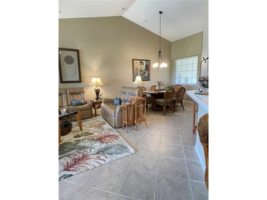 Nestled alongside the Flamingo Island Golf Course, this on Lely Resort Golf and Country Club in Florida - for sale on GolfHomes.com, golf home, golf lot