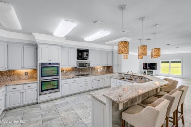 RELISTED WITH A WHOLE NEW LOOK !Located in the highly sought on Diamondhead Country Club in Mississippi - for sale on GolfHomes.com, golf home, golf lot