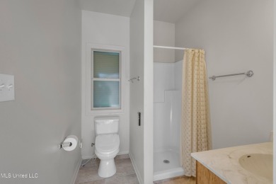 RELISTED WITH A WHOLE NEW LOOK !Located in the highly sought on Diamondhead Country Club in Mississippi - for sale on GolfHomes.com, golf home, golf lot