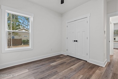 Discover a home that flawlessly blends modern sophistication on Carolina Shores Golf Course in North Carolina - for sale on GolfHomes.com, golf home, golf lot