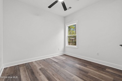 Discover a home that flawlessly blends modern sophistication on Carolina Shores Golf Course in North Carolina - for sale on GolfHomes.com, golf home, golf lot