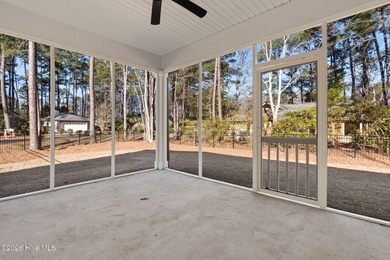 Discover a home that flawlessly blends modern sophistication on Carolina Shores Golf Course in North Carolina - for sale on GolfHomes.com, golf home, golf lot