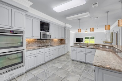 RELISTED WITH A WHOLE NEW LOOK !Located in the highly sought on Diamondhead Country Club in Mississippi - for sale on GolfHomes.com, golf home, golf lot