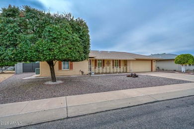 This charming 2 bedroom, 2 bath home has a bright living room on Sun City Lakes West and East in Arizona - for sale on GolfHomes.com, golf home, golf lot