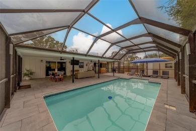 Under contract-accepting backup offers. Stunning Modern Pool on Clearwater Country Club in Florida - for sale on GolfHomes.com, golf home, golf lot