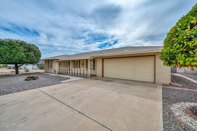 This charming 2 bedroom, 2 bath home has a bright living room on Sun City Lakes West and East in Arizona - for sale on GolfHomes.com, golf home, golf lot