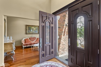 Truly an extraordinary custom residence, perfectly positioned on on St Clair River Country Club in Michigan - for sale on GolfHomes.com, golf home, golf lot