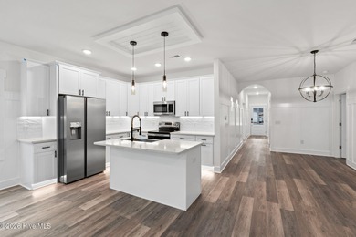 Discover a home that flawlessly blends modern sophistication on Carolina Shores Golf Course in North Carolina - for sale on GolfHomes.com, golf home, golf lot