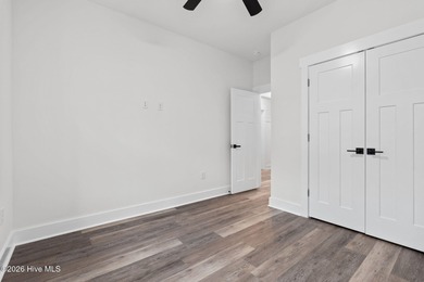 Discover a home that flawlessly blends modern sophistication on Carolina Shores Golf Course in North Carolina - for sale on GolfHomes.com, golf home, golf lot