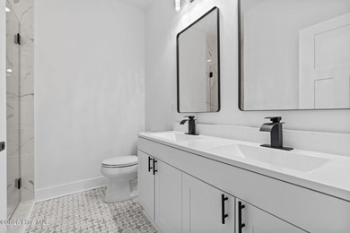 Discover a home that flawlessly blends modern sophistication on Carolina Shores Golf Course in North Carolina - for sale on GolfHomes.com, golf home, golf lot