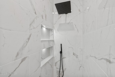 Discover a home that flawlessly blends modern sophistication on Carolina Shores Golf Course in North Carolina - for sale on GolfHomes.com, golf home, golf lot