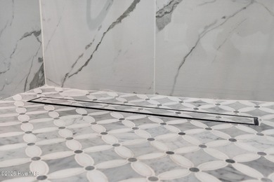 Discover a home that flawlessly blends modern sophistication on Carolina Shores Golf Course in North Carolina - for sale on GolfHomes.com, golf home, golf lot