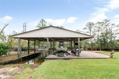 THE VIEW!! Quiet  Peaceful, BOATING!! Covered boat house with 2 on Cypress Country Club and Golf Club  in Alabama - for sale on GolfHomes.com, golf home, golf lot