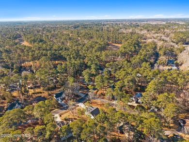 Discover a home that flawlessly blends modern sophistication on Carolina Shores Golf Course in North Carolina - for sale on GolfHomes.com, golf home, golf lot