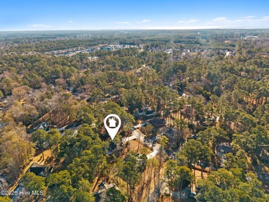 Discover a home that flawlessly blends modern sophistication on Carolina Shores Golf Course in North Carolina - for sale on GolfHomes.com, golf home, golf lot