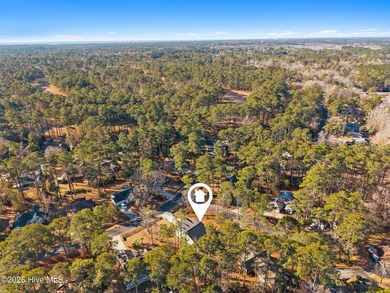 Discover a home that flawlessly blends modern sophistication on Carolina Shores Golf Course in North Carolina - for sale on GolfHomes.com, golf home, golf lot