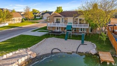 Lakefront Rambler with Private Dock, ADU Potential & Handicap on Stansbury Park Golf Club in Utah - for sale on GolfHomes.com, golf home, golf lot