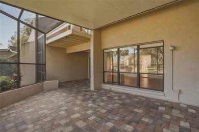 Located in the Fairway Lakes neighborhood of Carrollwood Village on Carrollwood Country Club in Florida - for sale on GolfHomes.com, golf home, golf lot