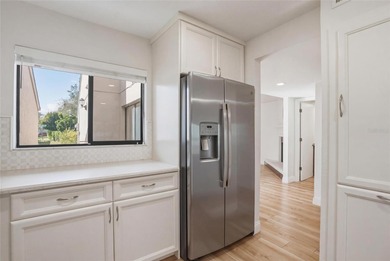 Located in the Fairway Lakes neighborhood of Carrollwood Village on Carrollwood Country Club in Florida - for sale on GolfHomes.com, golf home, golf lot