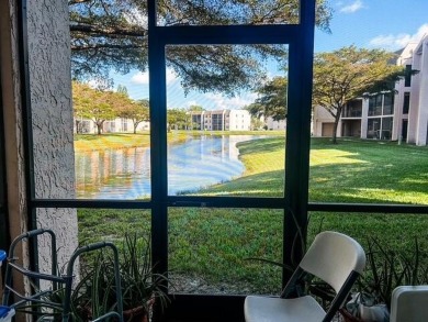 Discover this charming and conveniently located first-floor on Sunrise Lakes Phase IV Golf Course in Florida - for sale on GolfHomes.com, golf home, golf lot