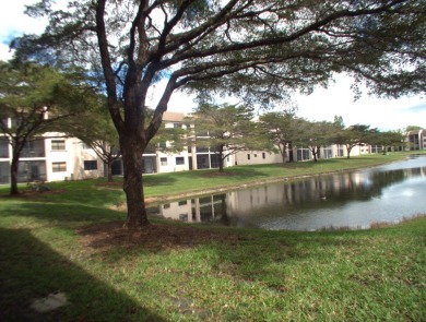 Discover this charming and conveniently located first-floor on Sunrise Lakes Phase IV Golf Course in Florida - for sale on GolfHomes.com, golf home, golf lot