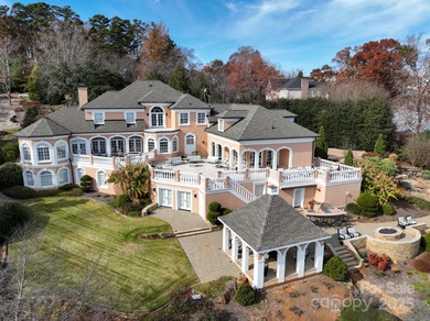 Truly a dream lakefront home on Badin Lake! With panoramic lake on Old North State Club at Uwharrie Point Golf community in North Carolina - for sale on GolfHomes.com, golf home, golf lot