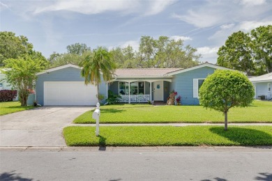 Under contract-accepting backup offers. Welcome to your on The Dunedin Country Club in Florida - for sale on GolfHomes.com, golf home, golf lot