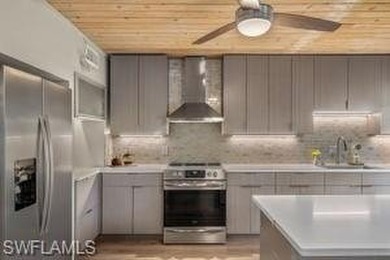 A Rare Opportunity awaits you on this 4-3 Mid Century Modern on Fort Myers Country Club in Florida - for sale on GolfHomes.com, golf home, golf lot