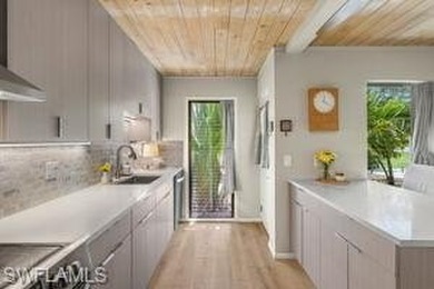 A Rare Opportunity awaits you on this 4-3 Mid Century Modern on Fort Myers Country Club in Florida - for sale on GolfHomes.com, golf home, golf lot