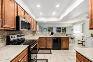 WELCOME to this beautiful, bright & cheery Gemini home situated on Union Hills Country Club in Arizona - for sale on GolfHomes.com, golf home, golf lot