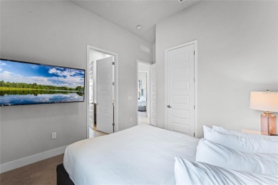 Experience the epitome of luxury resort living in this stunning on Reunion Resort Golf Course in Florida - for sale on GolfHomes.com, golf home, golf lot
