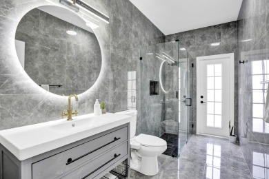 Prepare to be captivated by this newly remodeled five-bedroom on Winston Trails Golf Course in Florida - for sale on GolfHomes.com, golf home, golf lot
