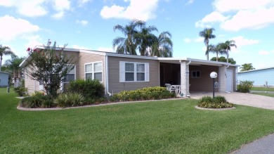 Here is your gorgeous triple-wide dream home on a corner lot on Schalamar Creek Golf and Country Club in Florida - for sale on GolfHomes.com, golf home, golf lot