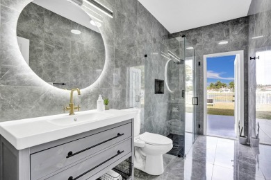 Prepare to be captivated by this newly remodeled five-bedroom on Winston Trails Golf Course in Florida - for sale on GolfHomes.com, golf home, golf lot