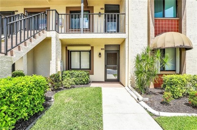 End unit in Clubhouse Village, priced to sell! Beautifully on  in Florida - for sale on GolfHomes.com, golf home, golf lot