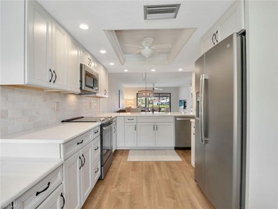 End unit in Clubhouse Village, priced to sell! Beautifully on  in Florida - for sale on GolfHomes.com, golf home, golf lot