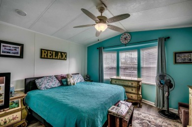 Situated on an oversized lot, this clean, bright, and move-in on Barefoot Resort and Golf Club  in South Carolina - for sale on GolfHomes.com, golf home, golf lot