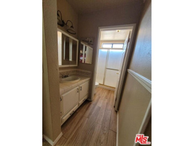 Large and spacious home with 3 BR/ 2 Ba, office, indoor laundry on Tierra Del Sol Golf Course in California - for sale on GolfHomes.com, golf home, golf lot
