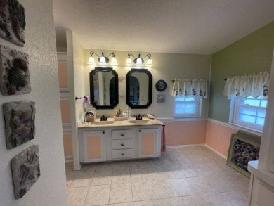 HUGE PRICE REDUCTION ~ SAVE $14,900! This spacious home offers on Four Lakes Golf Club in Florida - for sale on GolfHomes.com, golf home, golf lot