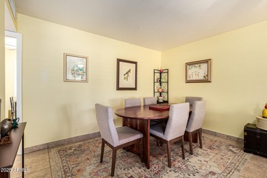 Huge lot. Swimming pool. Beautifully landscaped with grass. This on Sun City Country Club in Arizona - for sale on GolfHomes.com, golf home, golf lot