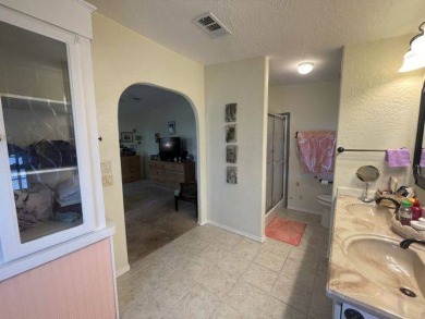 HUGE PRICE REDUCTION ~ SAVE $14,900! This spacious home offers on Four Lakes Golf Club in Florida - for sale on GolfHomes.com, golf home, golf lot
