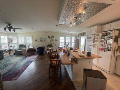 HUGE PRICE REDUCTION ~ SAVE $14,900! This spacious home offers on Four Lakes Golf Club in Florida - for sale on GolfHomes.com, golf home, golf lot
