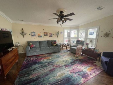 HUGE PRICE REDUCTION ~ SAVE $14,900! This spacious home offers on Four Lakes Golf Club in Florida - for sale on GolfHomes.com, golf home, golf lot